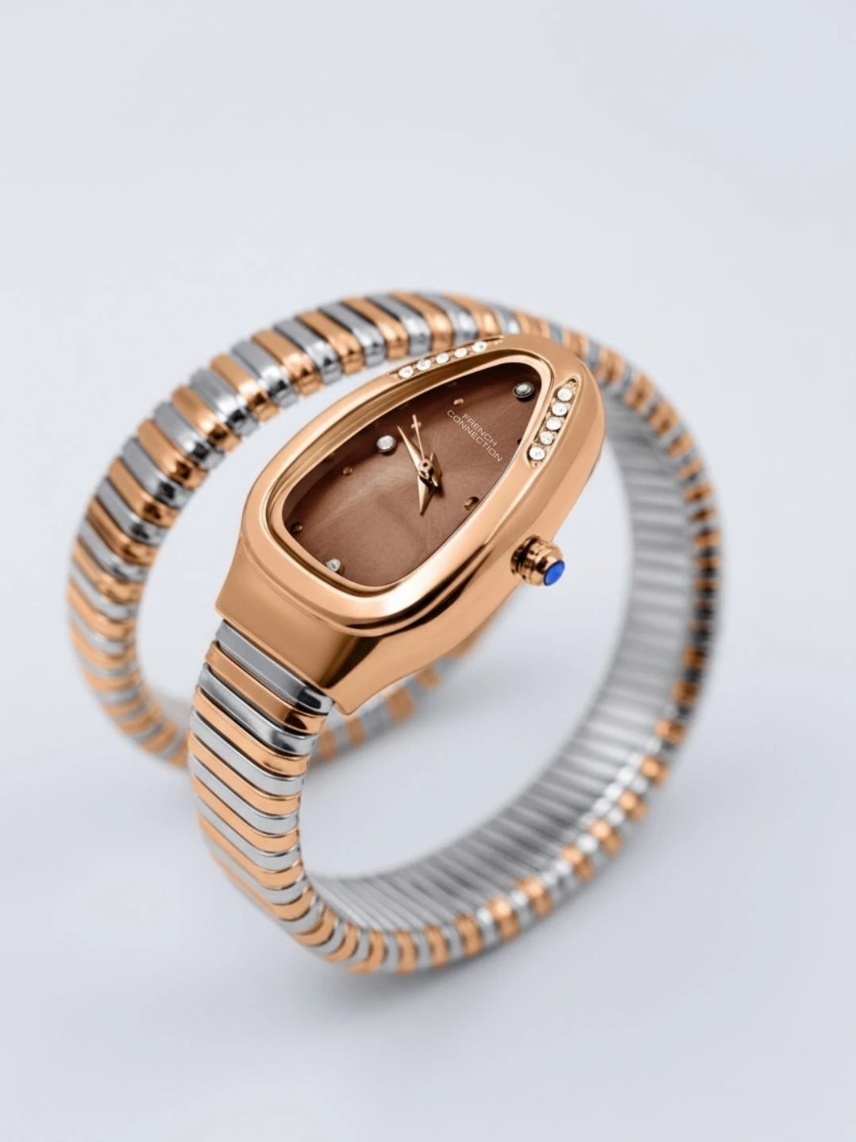 French Connection The Mystic Curve Women's Rose Gold Watch | Rhinestones Brown Sunray Dial Analog Watch – For Women FCN0110BRTM