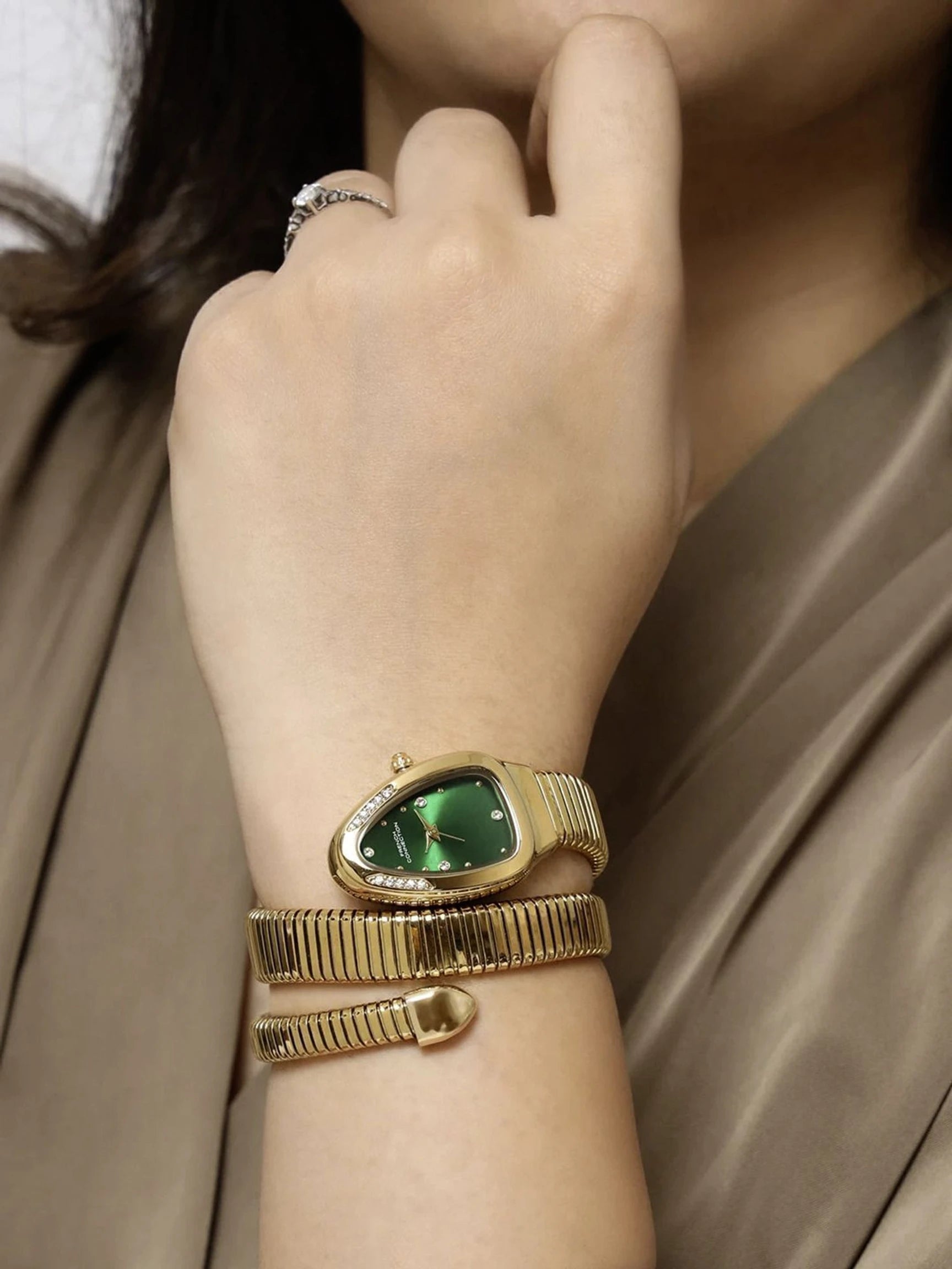 French Connection The Mystic Curve Women's Gold Watch | Rhinestones Green Sunray Dial Analog Watch – For Women FCN0110GM