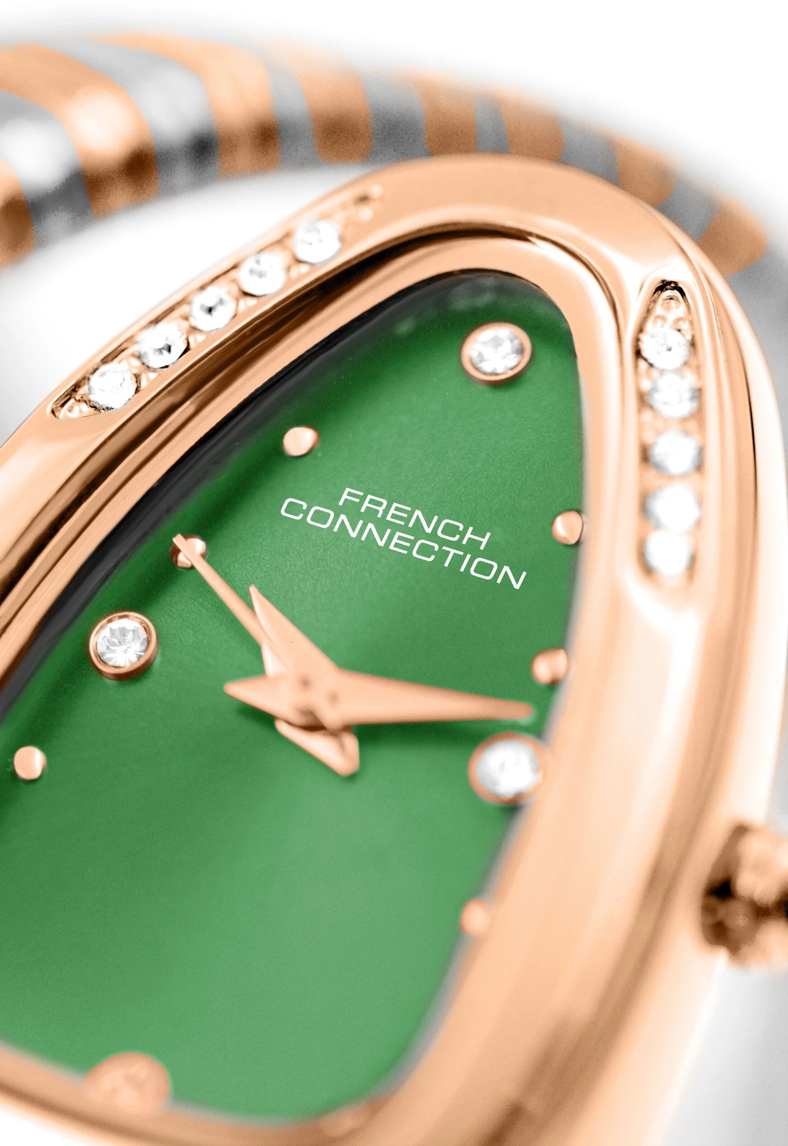 French Connection The Mystic Curve Women's Rose Gold Watch | Rhinestones Green Sunray Dial Analog Watch – For Women FCN0110NRTM