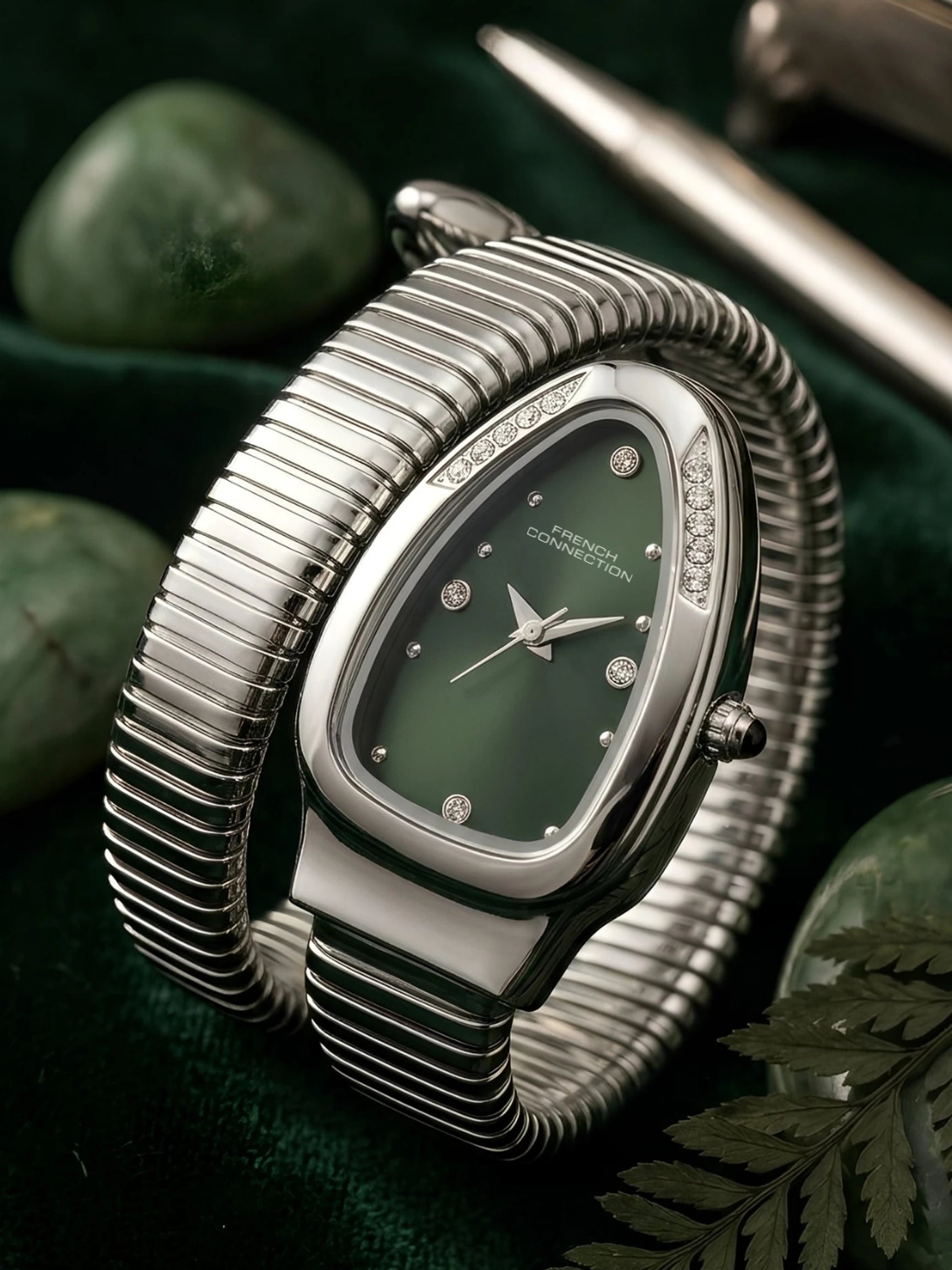 French Connection The Mystic Curve Women's Silver Watch | Rhinestones Green Sunray Dial Analog Watch – For Women FCN0110NSM