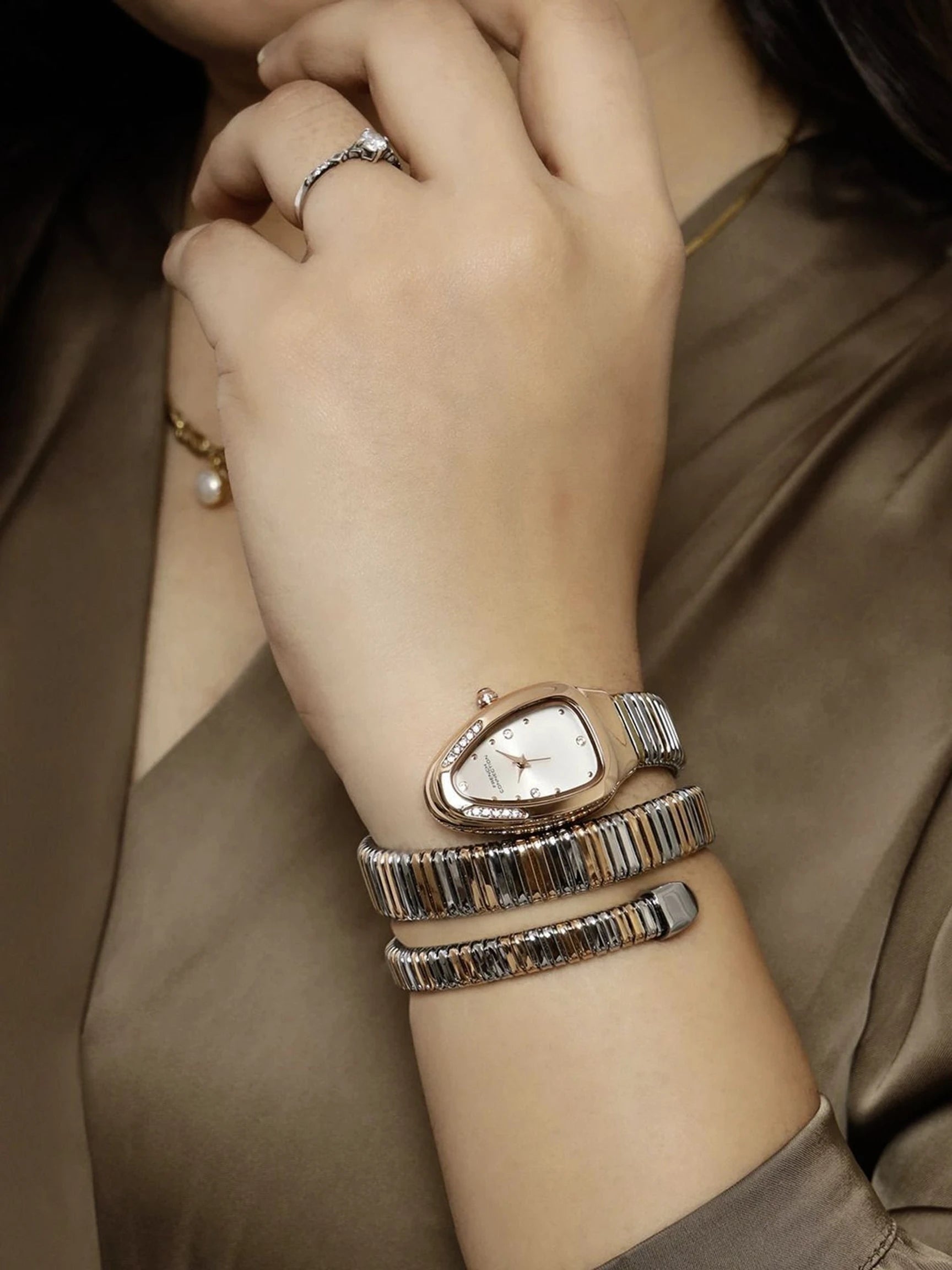 French Connection The Mystic Curve Women's Rose Gold Watch | Rhinestones Silver Sunray Dial Analog Watch – For Women FCN0110SRTM