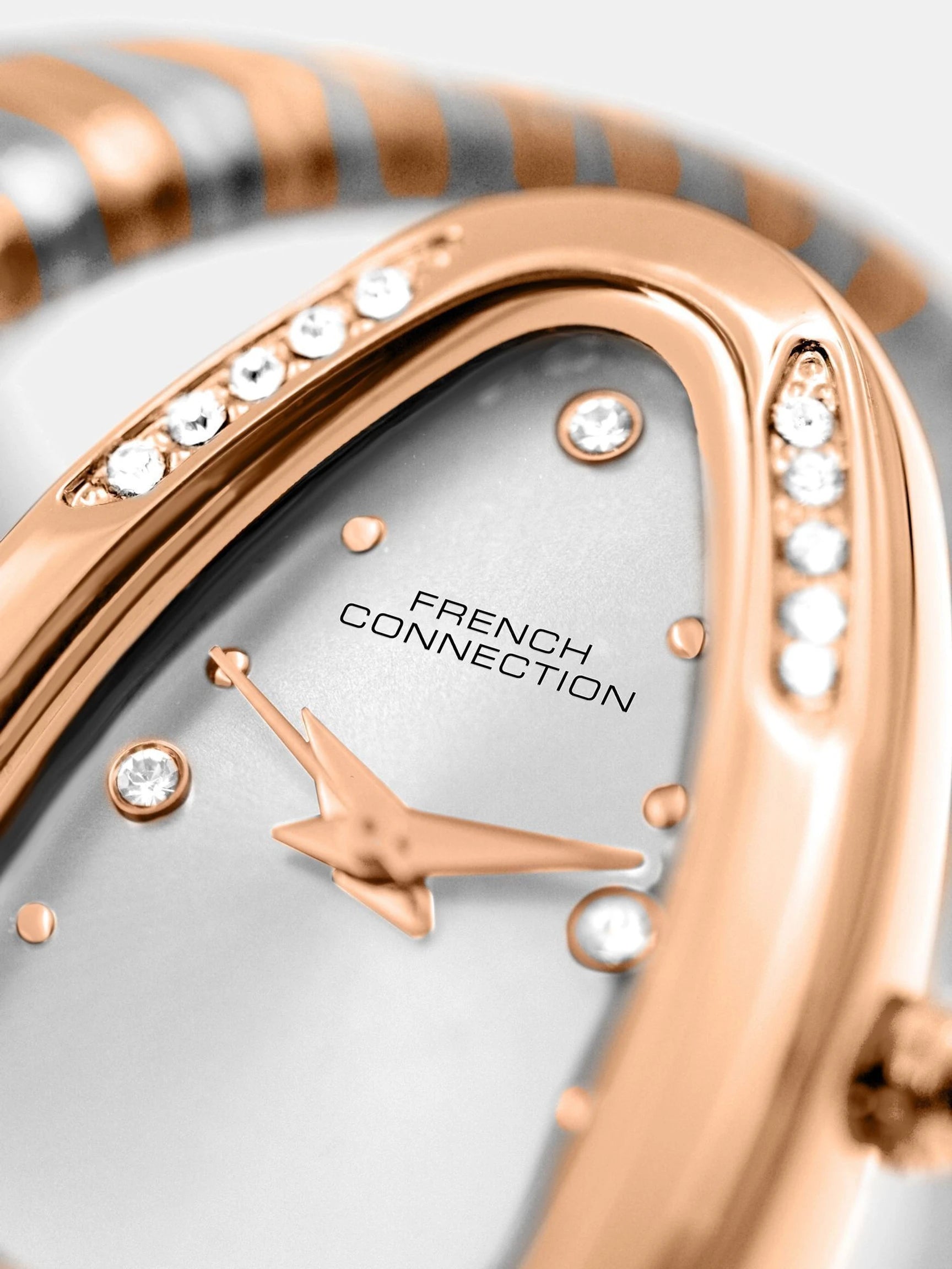 French Connection The Mystic Curve Women's Rose Gold Watch | Rhinestones Silver Sunray Dial Analog Watch – For Women FCN0110SRTM