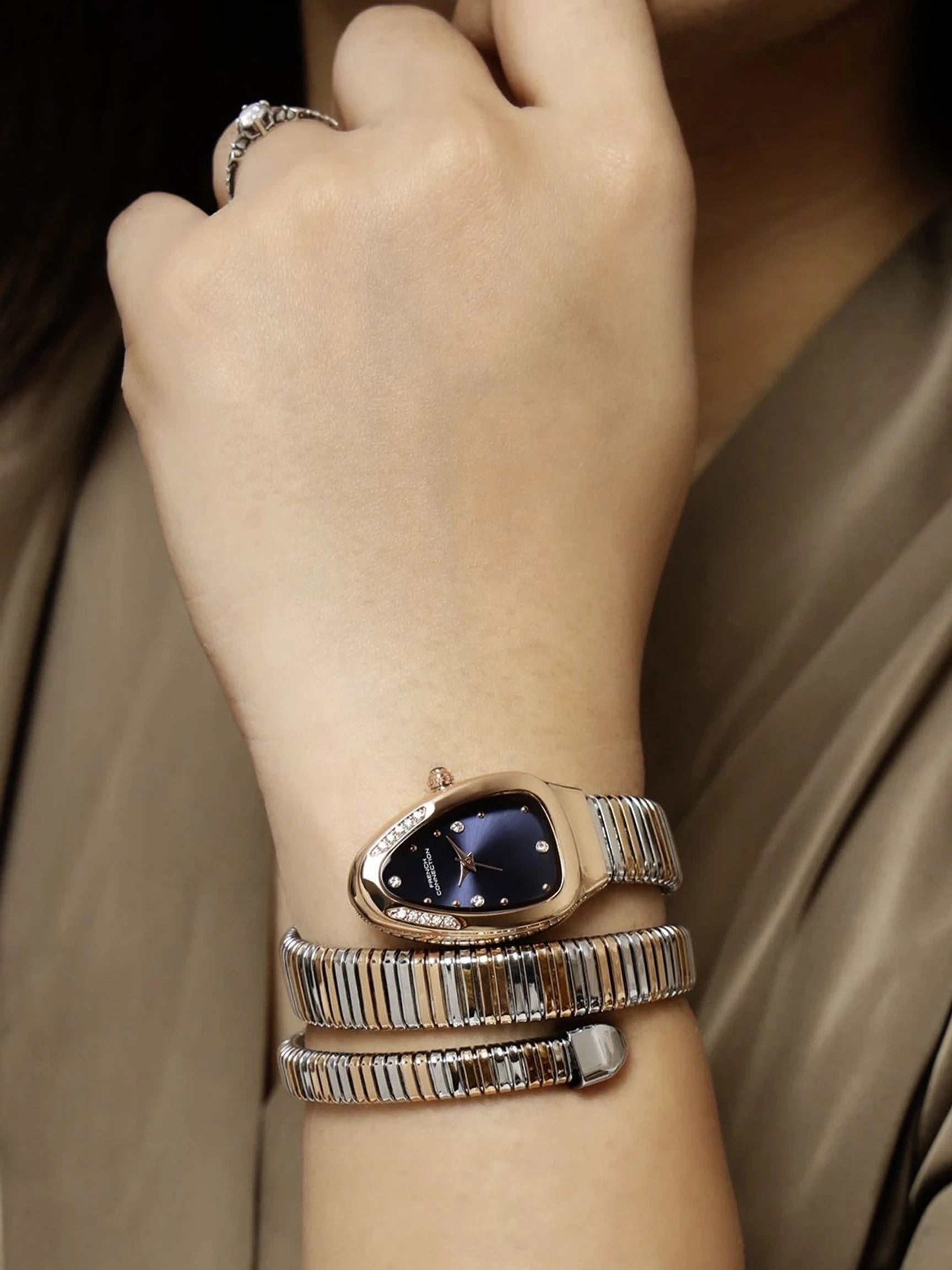 French Connection The Mystic Curve Women's Rose Gold Watch | Rhinestones Blue Sunray Dial Analog Watch – For Women FCN0110URTM