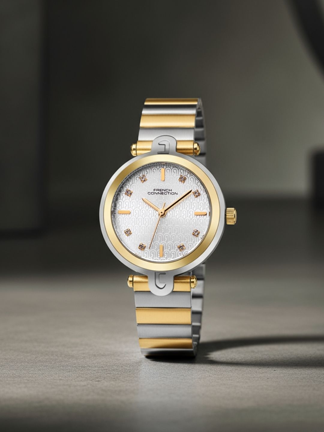 French Connection Textured Silver Round Dial With Gold Two Tone Stainless Steel Strap Watch - For Womens FCH25TM