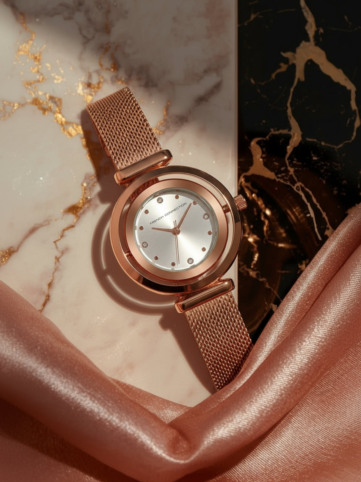 French Connection Sunray Silver Round Dial With Rose Stainless Steel Strap Watch - For Womens FCMX1SRGM