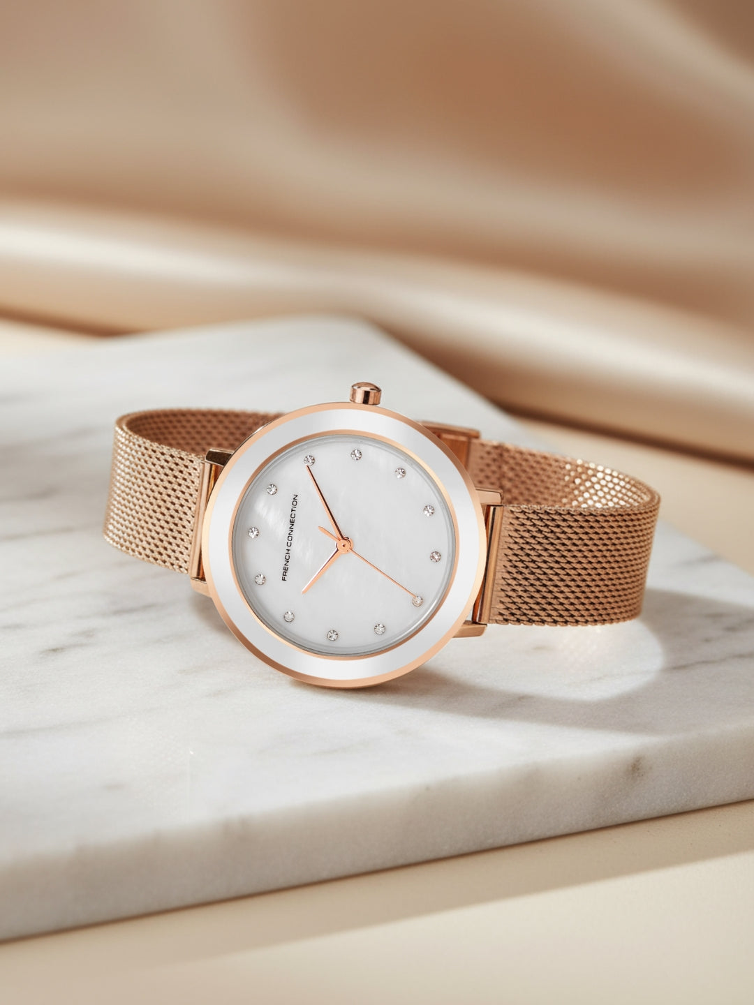 French Connection Sunray Silver Round Dial With Rose Stainless Steel Strap Watch - For Womens FCMX2SRGM