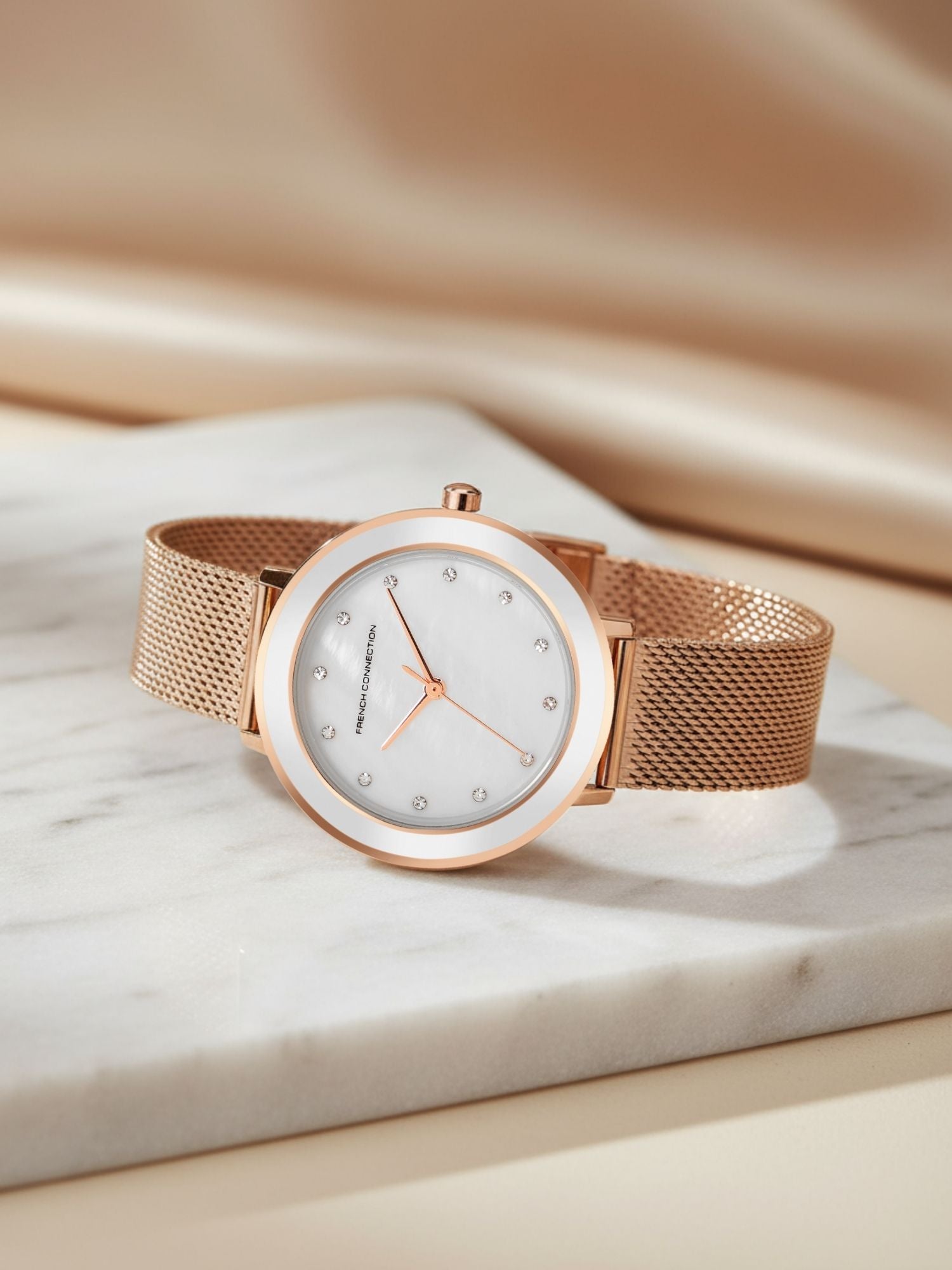 French Connection Sunray Silver Round Dial With Rose Stainless Steel Strap Watch - For Womens FCMX2SRGM
