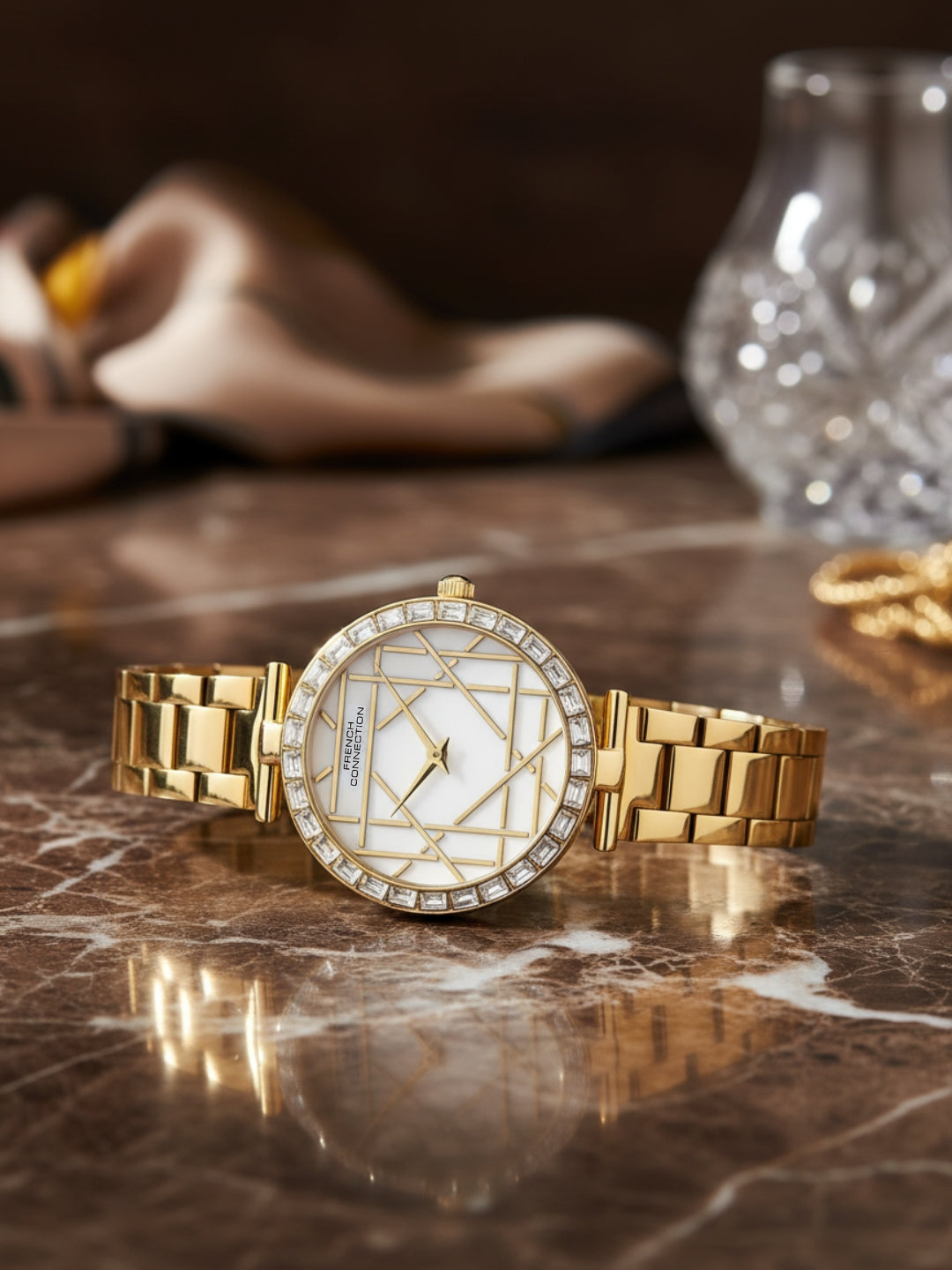 French Connection Mop Silver Round Dial With Gold Stainless Steel Strap Watch - For Womens FCN0141SGM