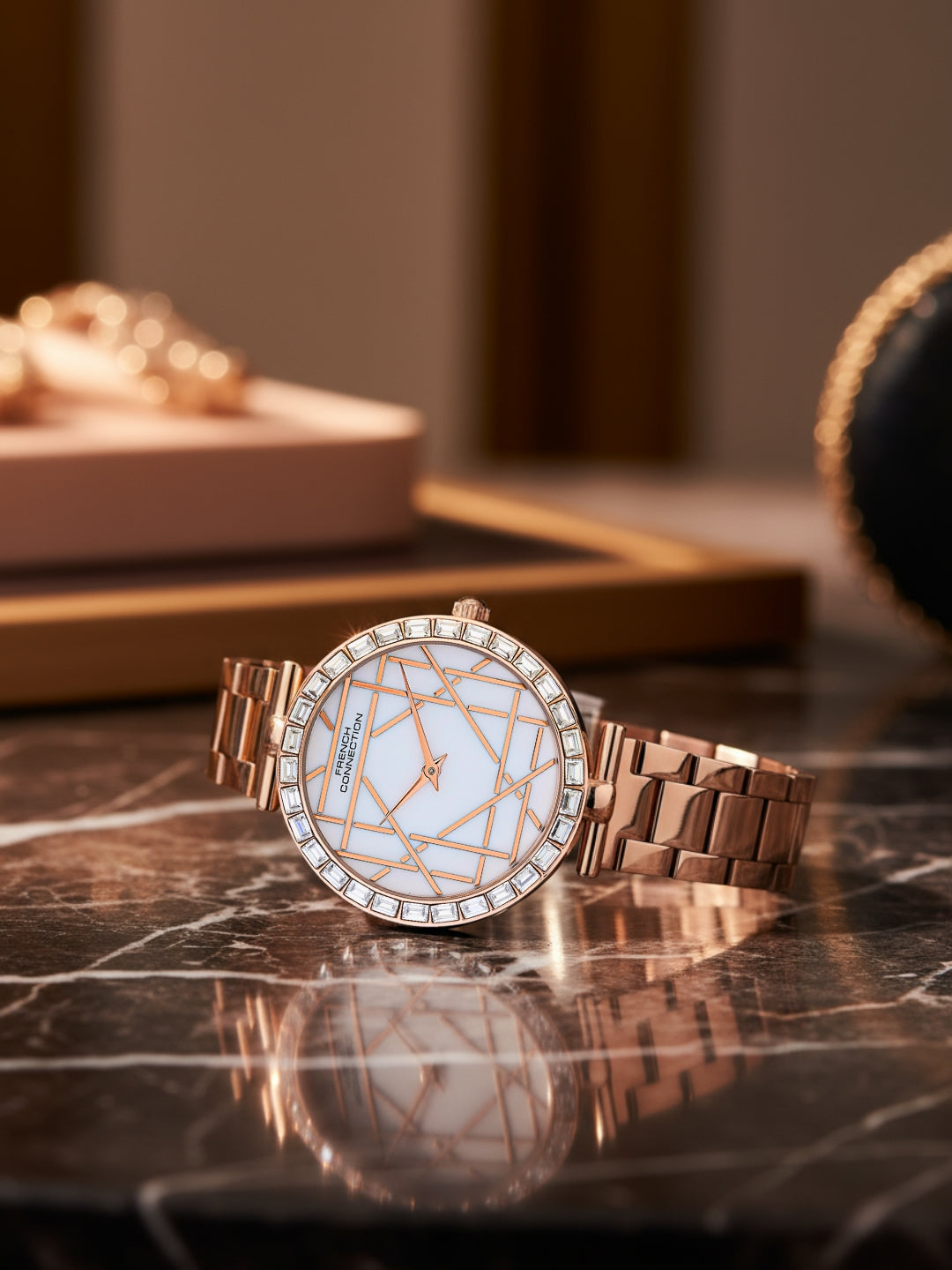 French Connection Mop Silver Round Dial With Rose Stainless Steel Strap Watch - For Womens FCN0141SRGM