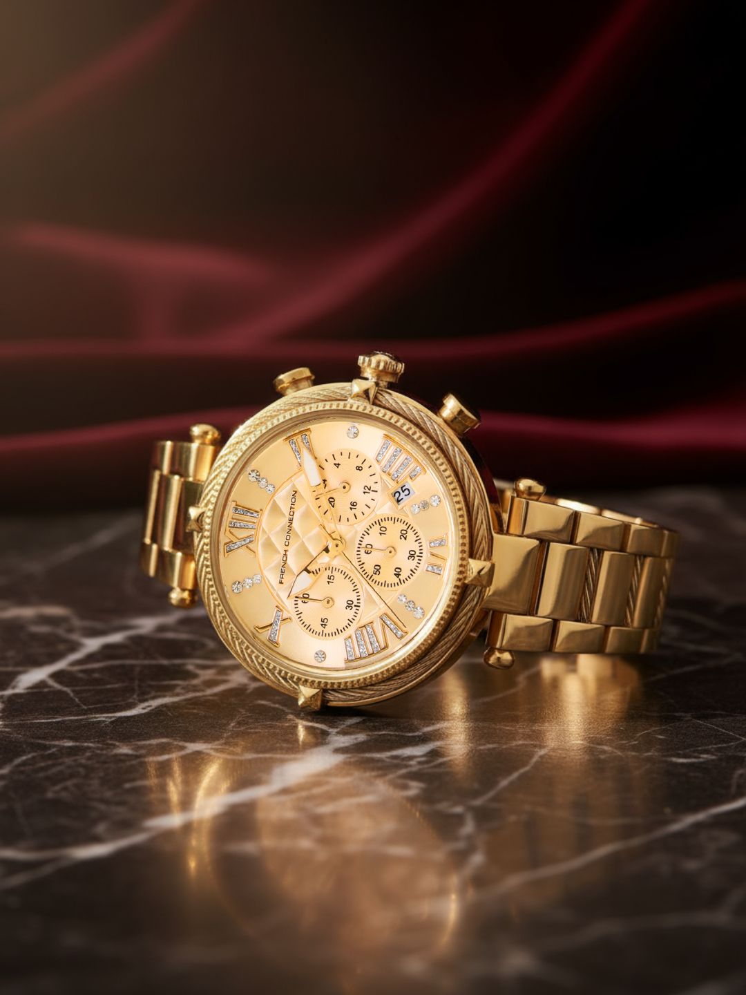 French Connection Embossed Round Dial With 12Pcs Stones Champagne Dial With Gold Stainless Steel Strap Chronograph Watch - For Womens FCO4GM