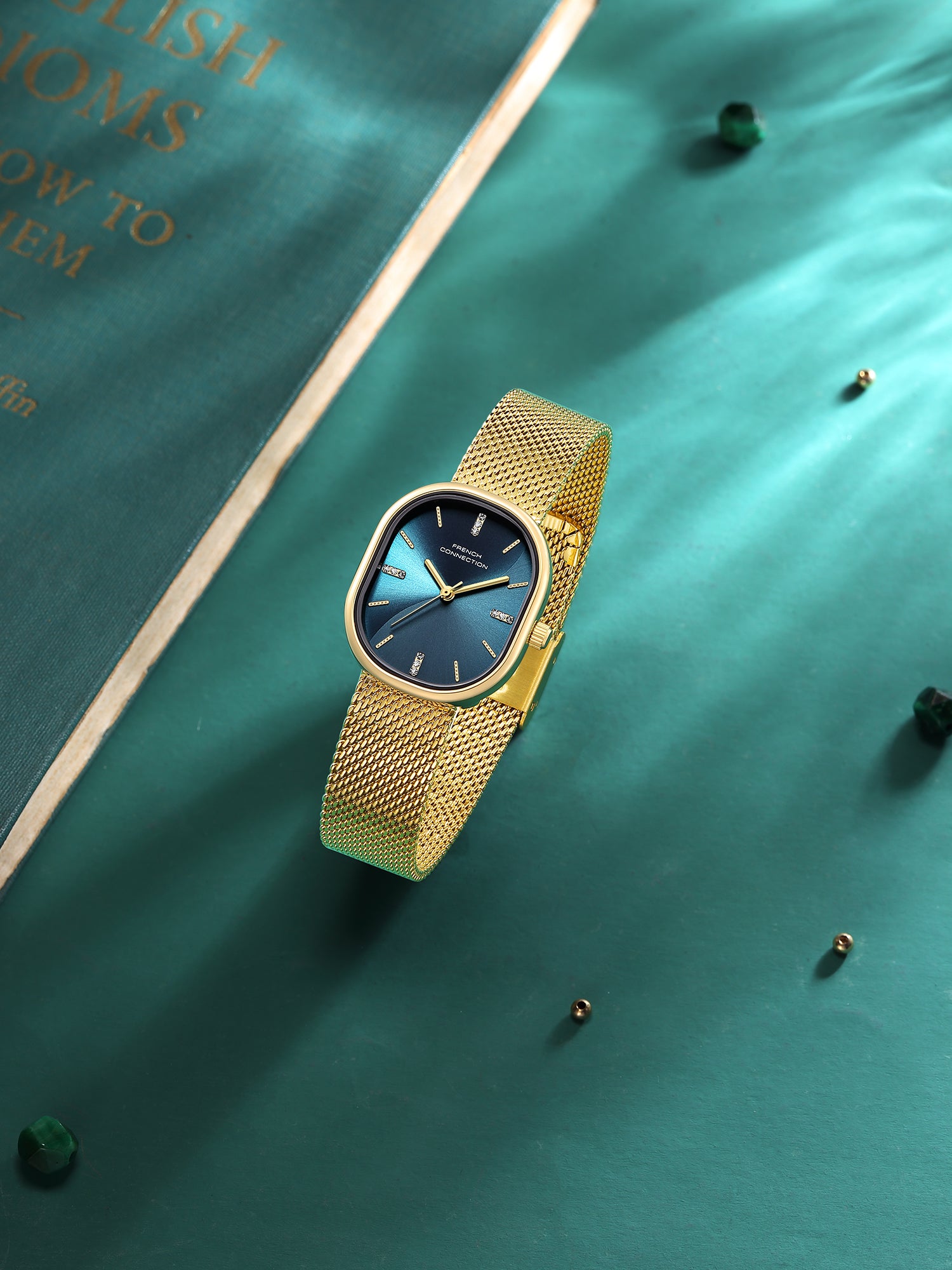 French Connection Éclora | Analog Display | Blue Sunray Dial | Gold Stainless Steel Strap | Watch for Women - FCU13NGM
