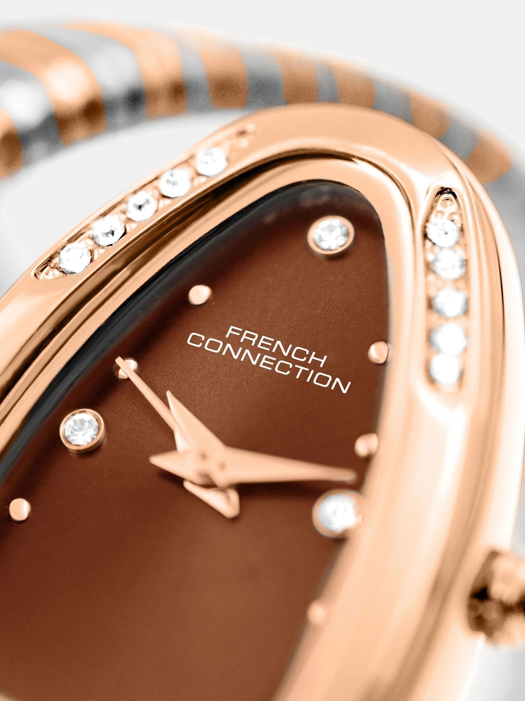 French Connection The Mystic Curve Women's Rose Gold Watch | Rhinestones Brown Sunray Dial Analog Watch – For Women FCN0110BRTM