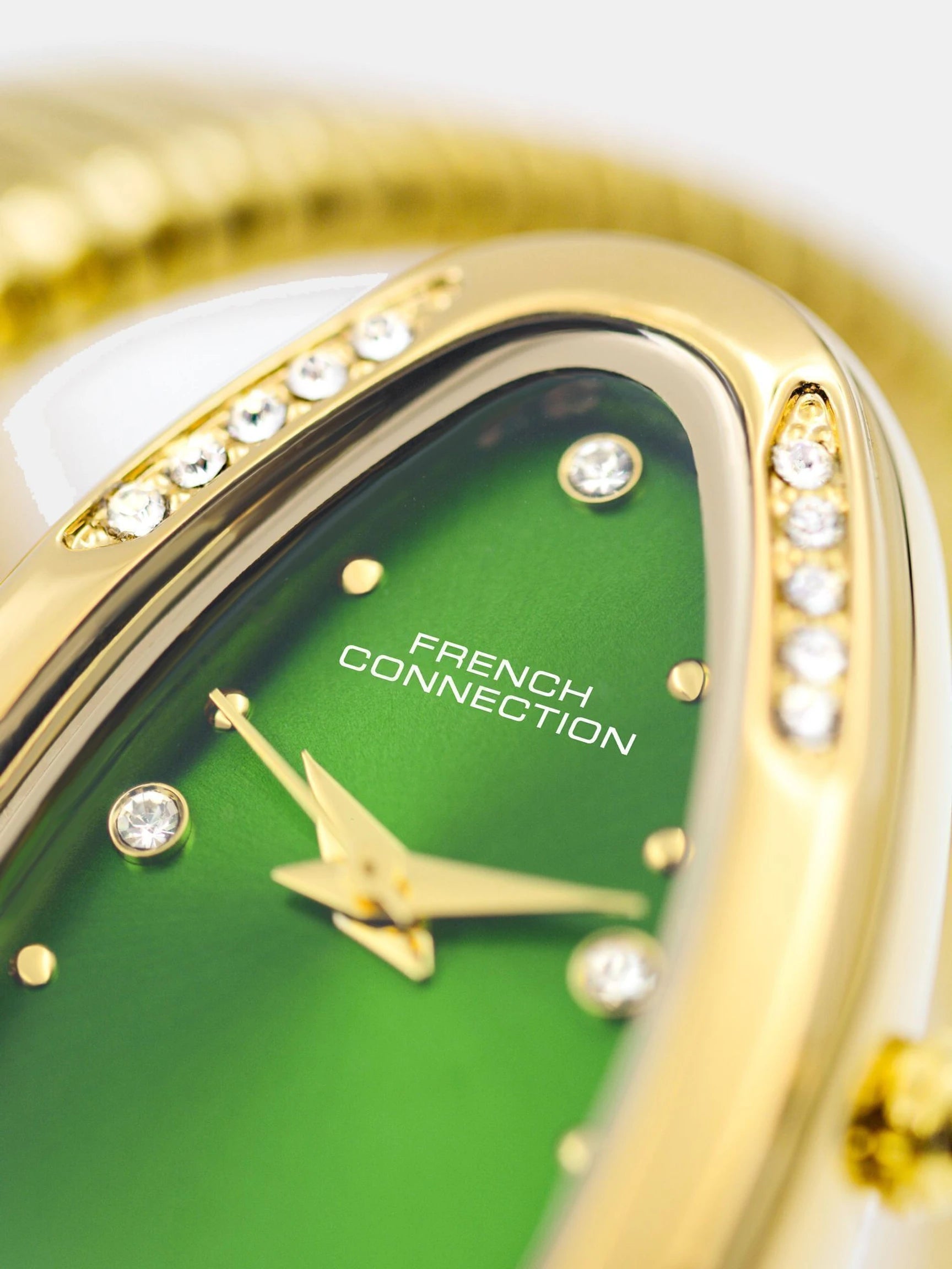 French Connection The Mystic Curve Women's  Gold Watch | Rhinestones Green Sunray Dial Analog Watch – For Women FCN0110GM