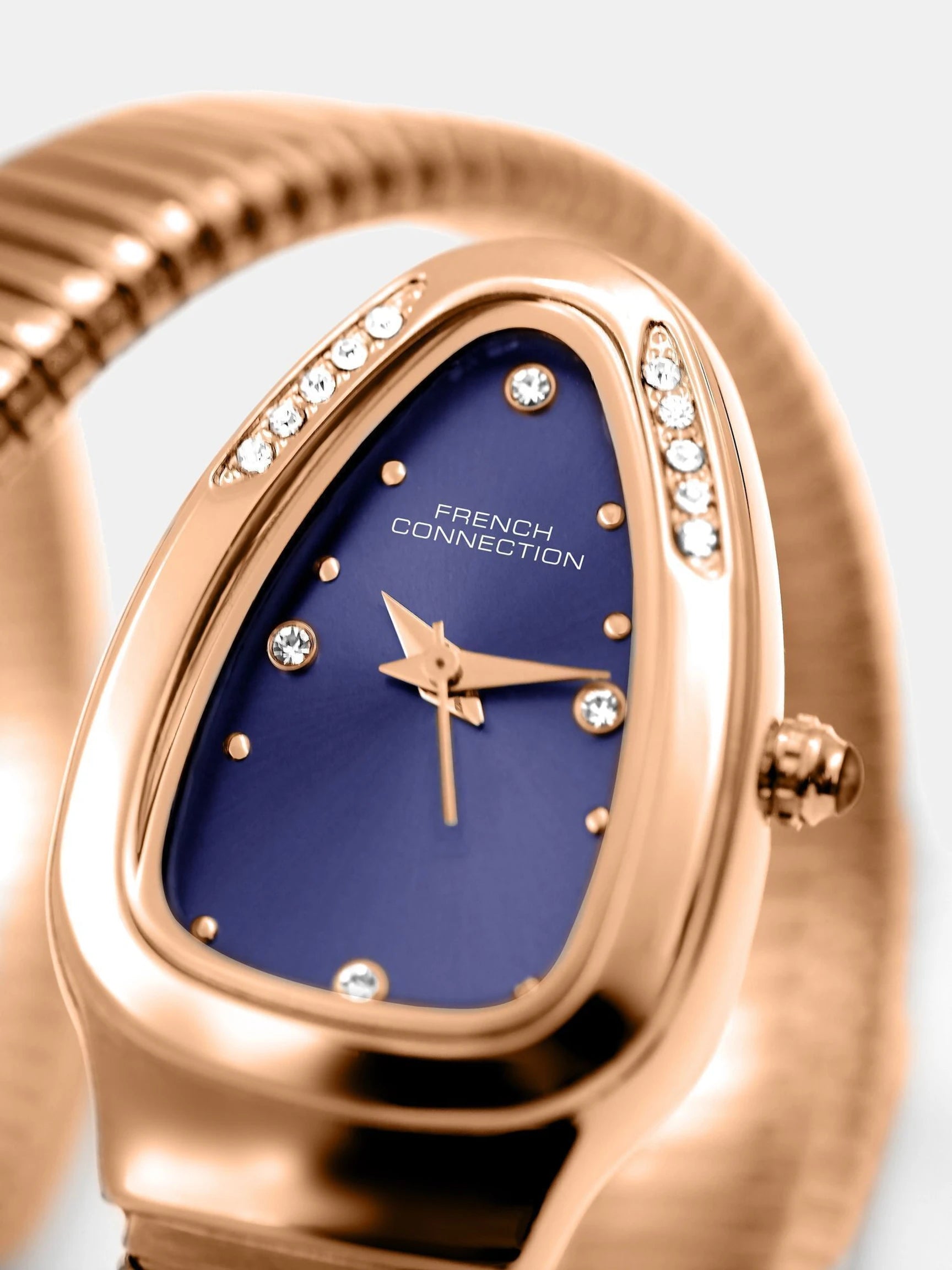 French Connection The Mystic Curve Women's Rose Gold Watch | Rhinestones Blue Sunray Dial Analog Watch – For Women FCN0110RGM