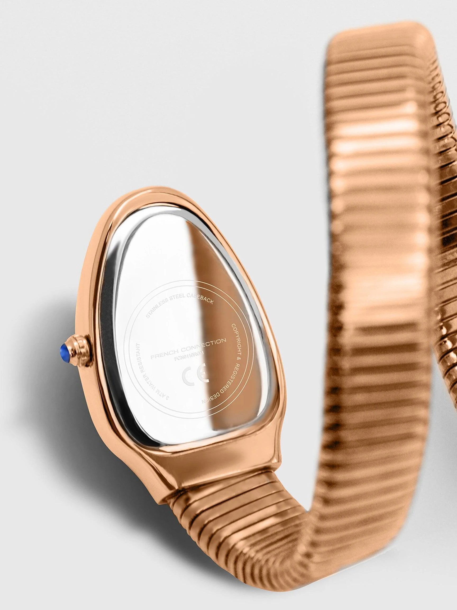 French Connection The Mystic Curve Women's Rose Gold Watch | Rhinestones Blue Sunray Dial Analog Watch – For Women FCN0110RGM