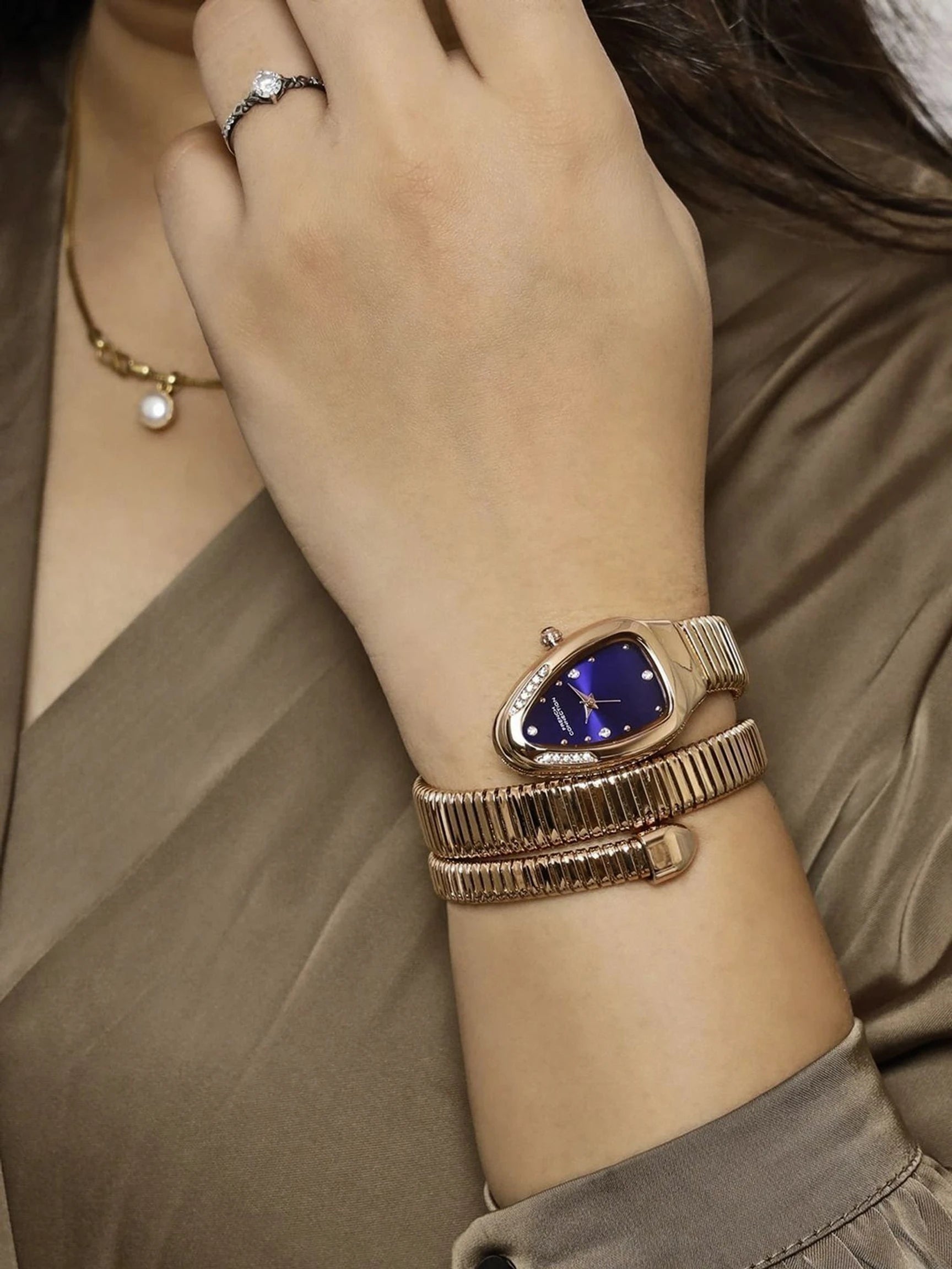 French Connection The Mystic Curve Women's Rose Gold Watch | Rhinestones Blue Sunray Dial Analog Watch – For Women FCN0110RGM