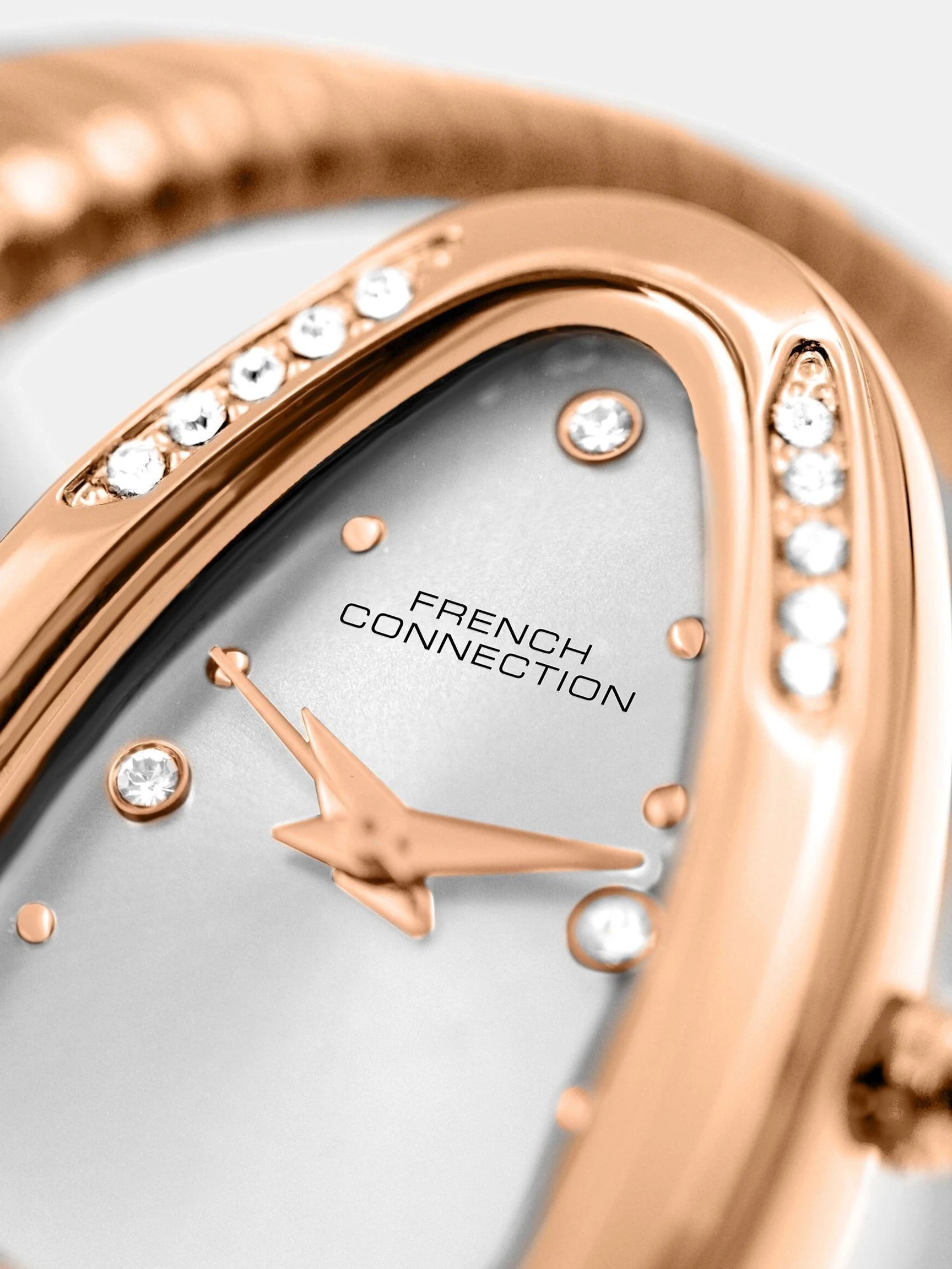 French Connection The Mystic Curve Women's Rose Gold Watch | Rhinestones Silver Sunray Dial Analog Watch – For Women FCN0110SRGM