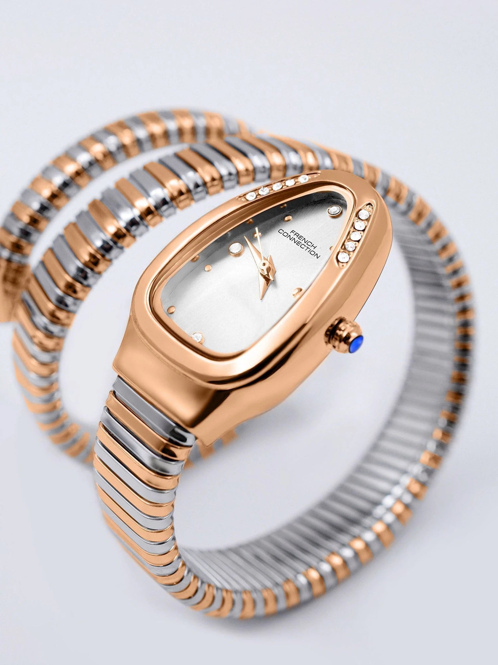 French Connection The Mystic Curve Women's Rose Gold Watch | Rhinestones Silver Sunray Dial Analog Watch – For Women FCN0110SRTM