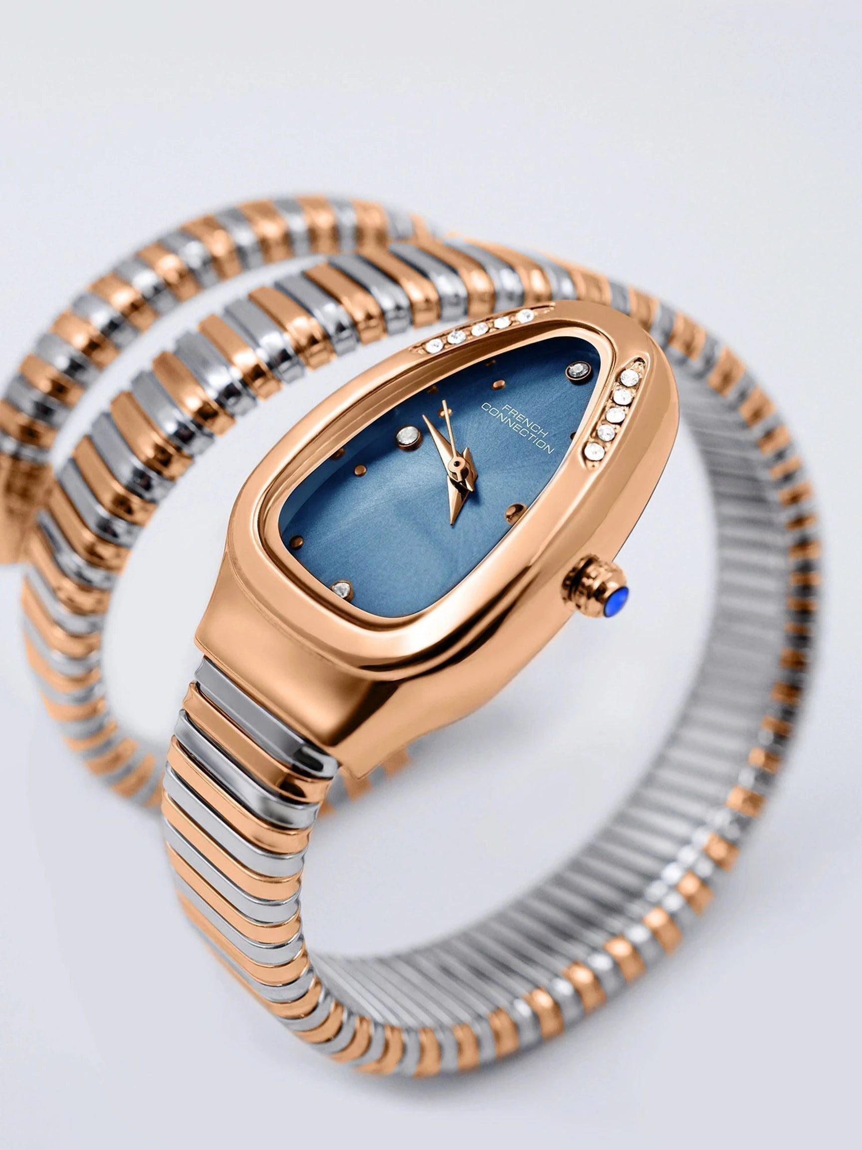 French Connection The Mystic Curve Women's Rose Gold Watch | Rhinestones Blue Sunray Dial Analog Watch – For Women FCN0110URTM