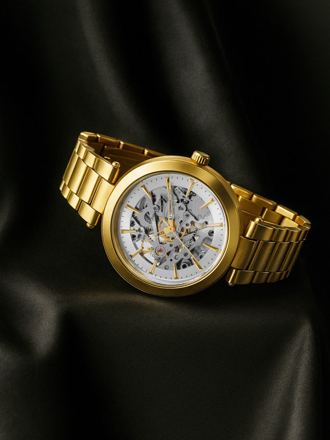 French Connection FCA21GM Modern Silver White Skeleton Dial Gold Stainless Steel Strap Women's Automatic Watch