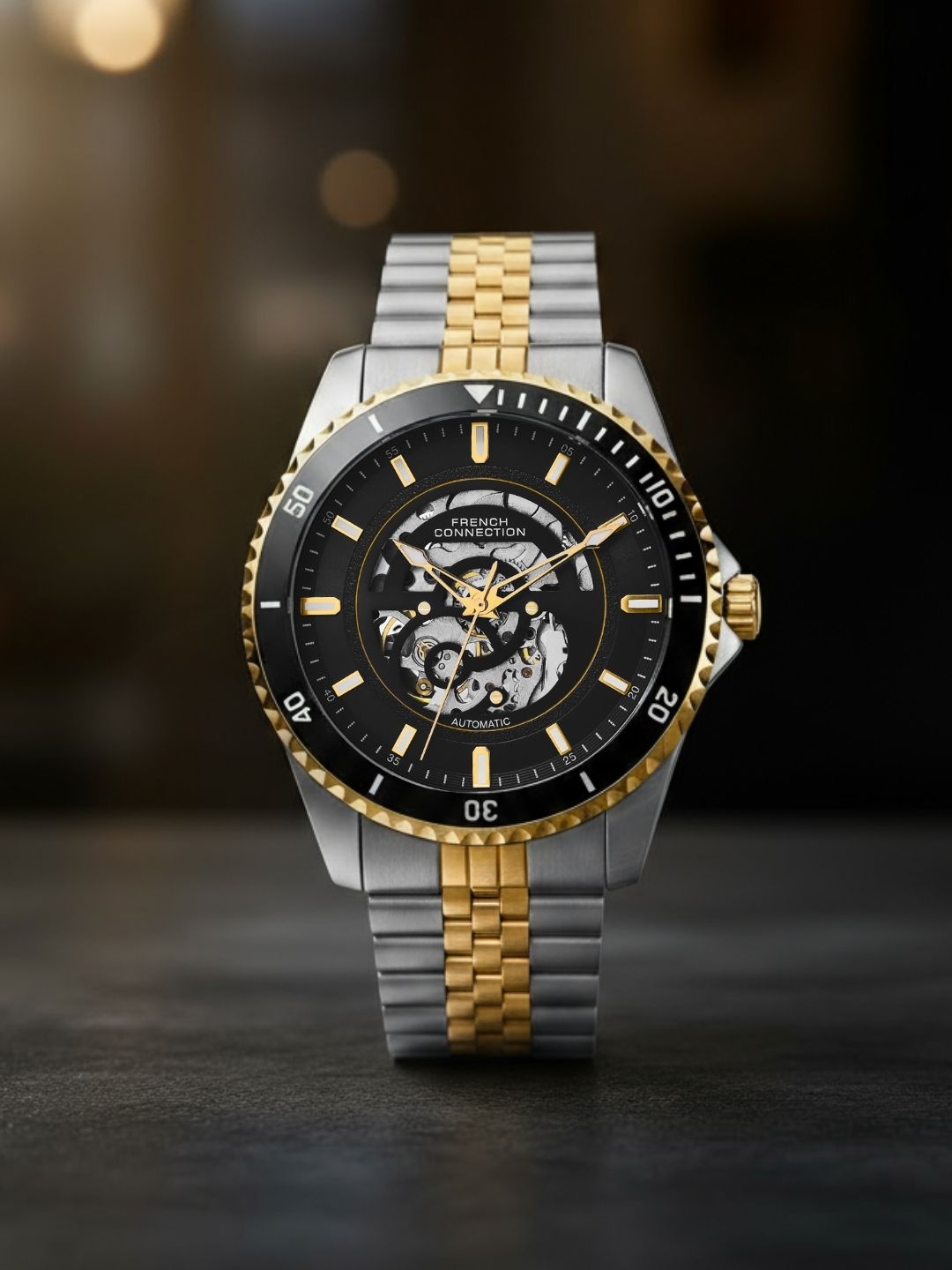 French Connection Aether Drive Men's Automatic Skeleton Watch with Black Sunray Dial, Two-Tone Gold & Silver Stainless Steel Bracelet – FCA26BTM