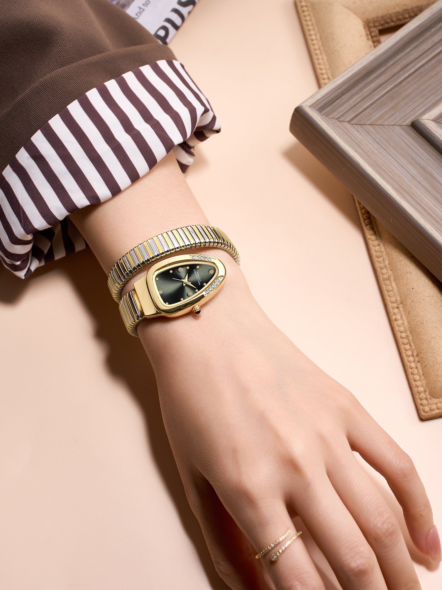 French Connection The Mystic Curve Women's Gold Watch | Rhinestones Green Sunray Dial Analog Watch – For Women FCN0110NGM